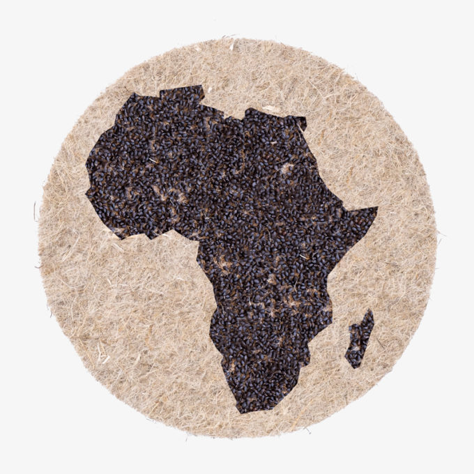 Afrika in seed shape on nature fibre pads