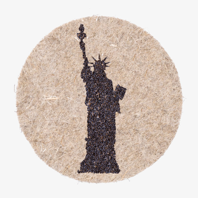 united states statue of liberty with plant seeds to grow